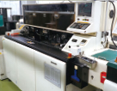 アキシャル自挿機の写真