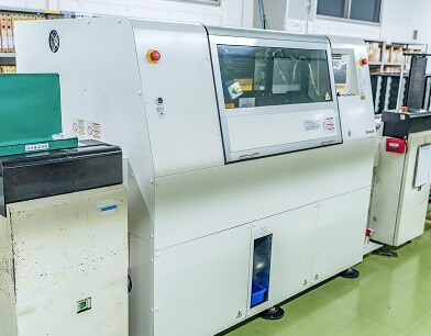 アキシャル自挿機の写真